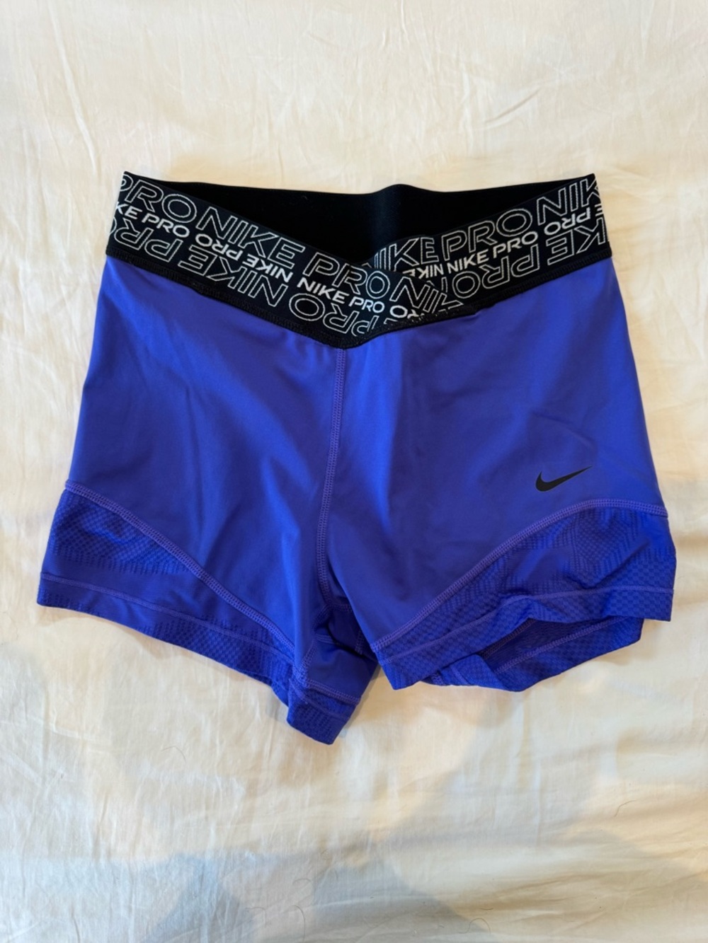 Nike Pro Women’s Athletic Shorts in Purple with Black Logo Waistband